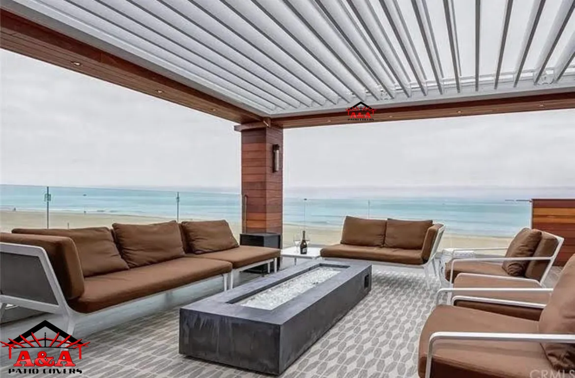 Louvered patio cover with wood-finish ceiling over a lounge with an open view