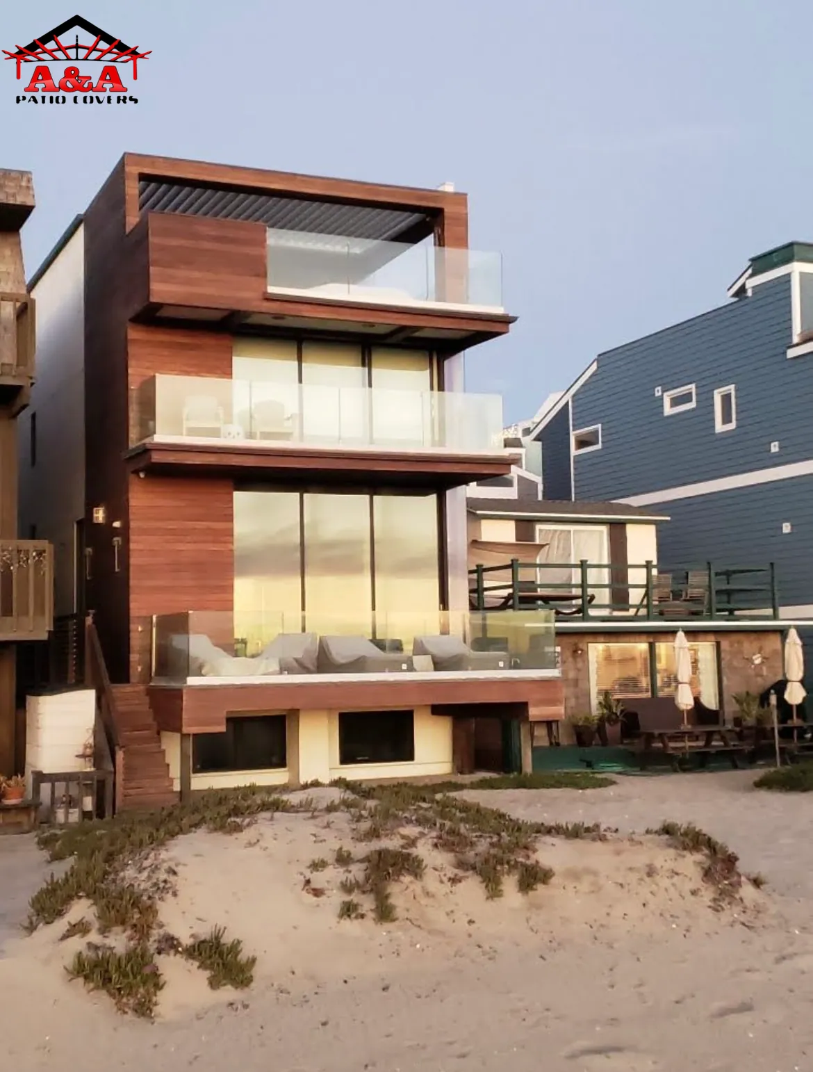 Multi-level deck and shade structure on a modern multi-story building