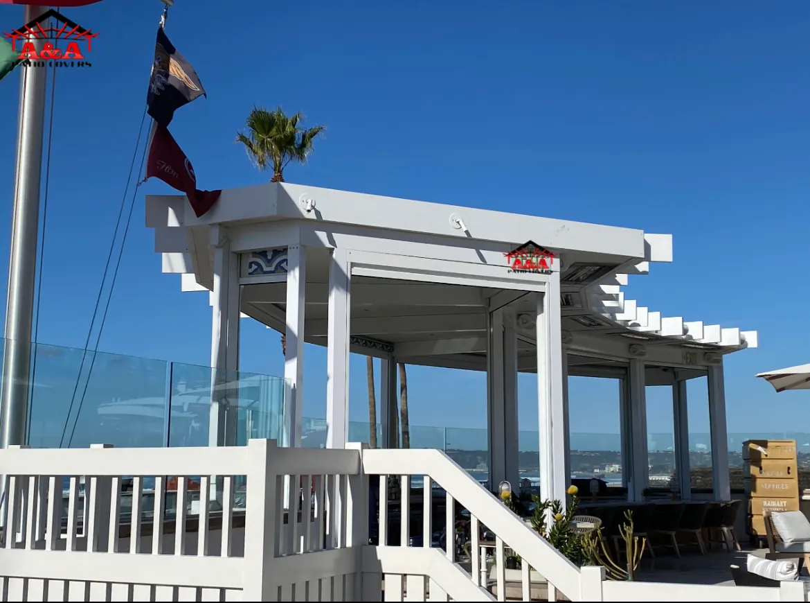 White canopy structure over a raised commercial deck