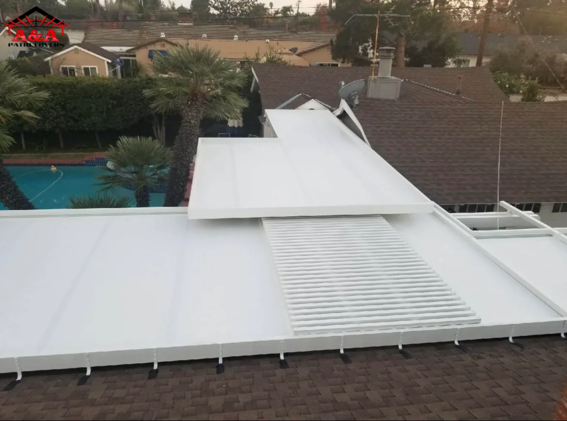 White solid patio cover over a pool deck and paver patio